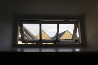 Gables through partly open transom window in Chipping Campden ,The Cotswolds, clipart