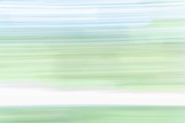 Abstract background or effect image on soft green and blue tones horizontal blurs with lower white band. clipart