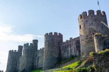 Outside stone fortifications of historic Conwy Castle with it's towers,castellations and high walls.11 clipart