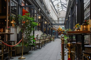 Cardiff Wales - August 6 2024; Wonderful traditional architecture and businesses inside Castle Arcade in City of Arcades. clipart