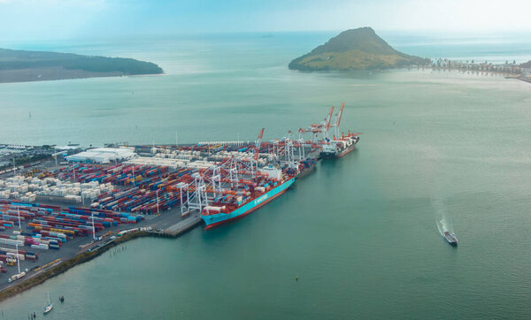 Tauranga New Zealand- September 1 2025; port and Mount Maunganui directly below.aerial from plane window, in flight to Auckland.