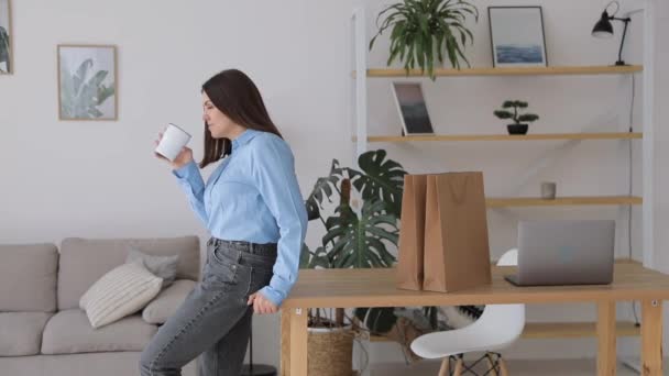 Calm Peaceful Young Woman Takes Break Rests Cup Hot Drink — Stock videók