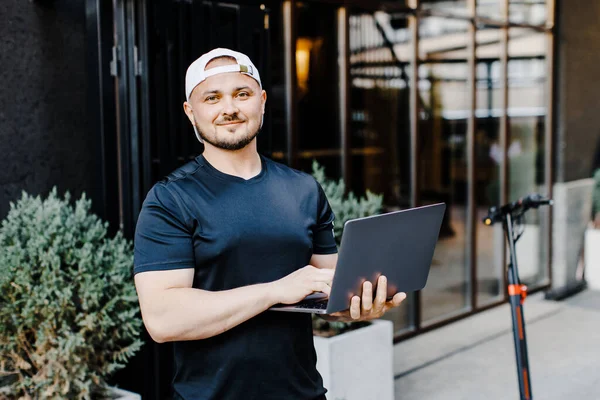 Handsome Man Works Online Freelancer Businessman Holding Laptop Standing Electric — Fotografia de Stock