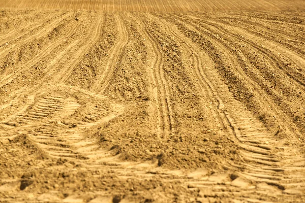 建設現場における砂中の重機の痕跡 — ストック写真