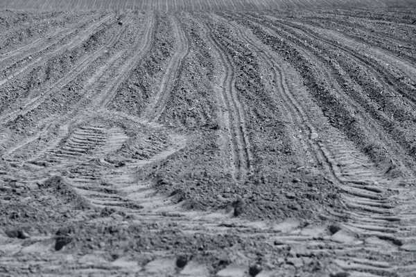 建設現場における砂中の重機の痕跡 — ストック写真
