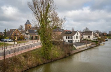 Dutch village of Tricht along the Linge river, Province Gelderland clipart