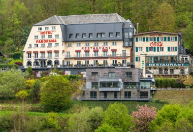Bouillon, Belgium, 05.05.2023, View of Hotel Panorama and Hotel Cosy located nearby the center of Bouillon clipart