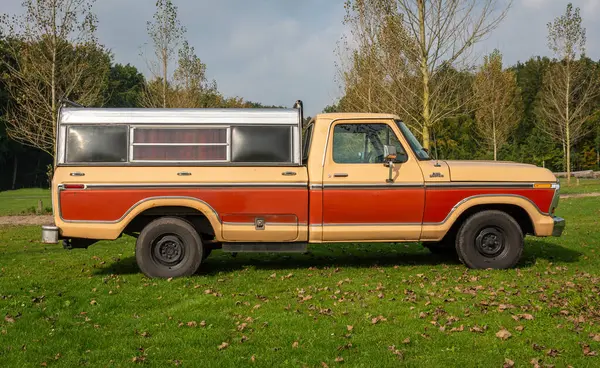 stock image Amstelveen, The Netherlands, 10.10.2021, Side view of classic Ford F150 4X2 Pick Up Custom from year 1978