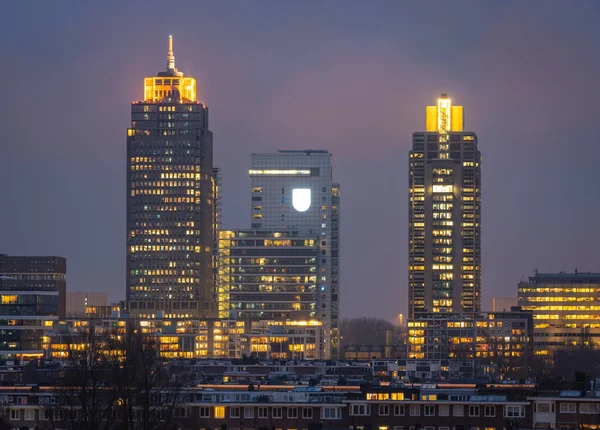 Skyline of Amsterdam at night, the tallest office towers nearby Amsterdam Amstel station