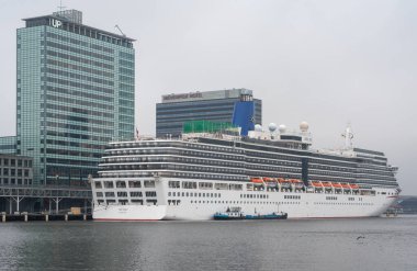 MS Arcadia cruise ship docked at The terminal of Cruise Port Amsterdam clipart