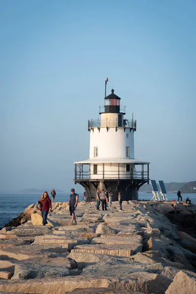 stock image The historic Spring Point Ledge Lighthouse at the end of an impressive, 900 foot granite breakwater ledge in South Portland, Maine.