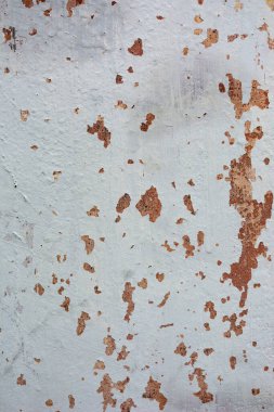 Grunge background texture. Rough concrete wall texture background. Old cracked plaster crumbles.