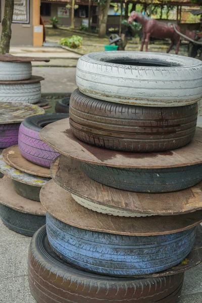 colorful tires stacked in a cafe in the afternoon