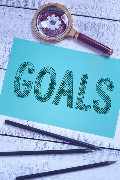 Подпись под текстом, представляющая цели, бизнес-показ желаемого результата, который человек планирует и обязуется достичь