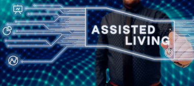 Destekli Yaşam ve İş Dünyası çalışanı, Man Holding Pen ve Yeni Fikirler İçerisindeki Fütüristik Çerçeveyi Gösterme ve Yönlendirme izni verdi.