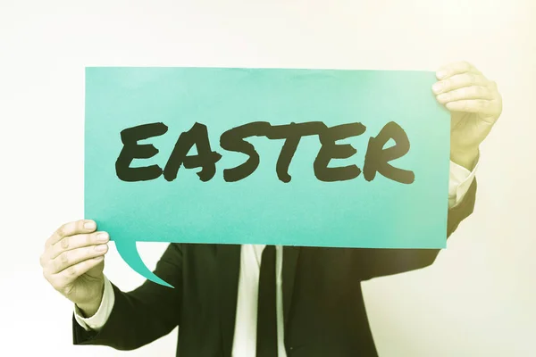 Hand writing sign Easter, Concept meaning holiday commemorating the resurrection of Jesus from the dead