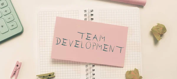 Sign displaying Team Development, Business idea expressing in recoverable and external form new thoughts Thinking New Writing Concepts, Breaking Through Writers Block