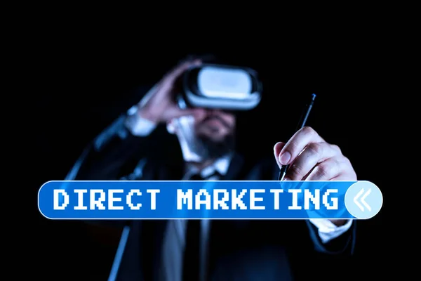 Text showing inspiration Direct Marketing, Business approach business of selling services directly to the public Man Wearing Virtual Reality Simulator Holding Pen During Training.