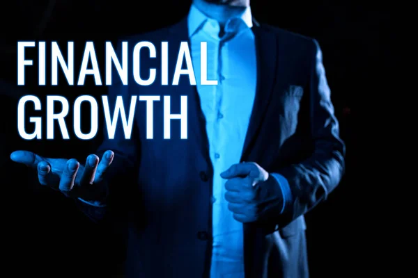 stock image Sign displaying Financial Growth, Business concept formal records of the financial activities of a business Businessman Holding And Presenting Important Informations On Hand.