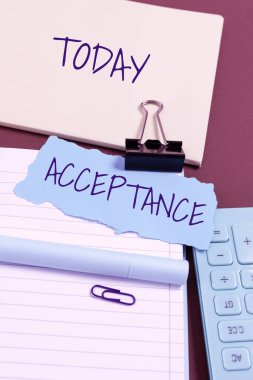 Kabullenmeyi gösteren metin işareti, bir şeyi resmi olarak almayı kabul ettiğinizde ya da alma eylemi yaptığınızda