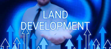 Arazi Geliştirme işaretini gösteren ilham kaynağı, altyapı inşaatı için arazi edinme kavramsal fotoğraf süreci