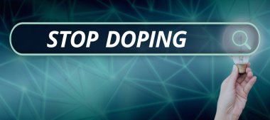 Doping ve iş yaklaşımının yasaklanmış atletik performans artırıcı ilaçların kullanımını bıraktığını gösteren metin işareti