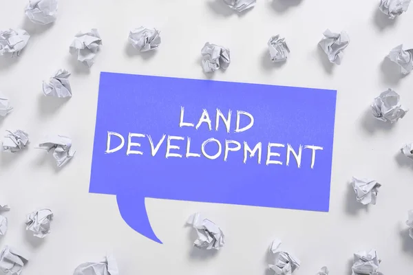 Conceptual caption Land Development, Internet Concept process of acquiring land for constructing infrastructures