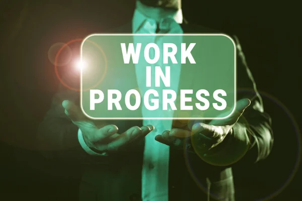 Firma Mostrando Trabajo Progreso Palabra Para Negocios Continuos Con Trabajo —  Fotos de Stock