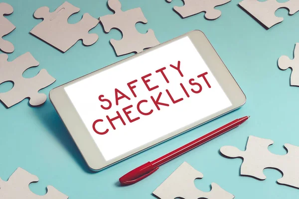 Hand writing sign Safety Checklist, Internet Concept list of items you need to verify, check or inspect