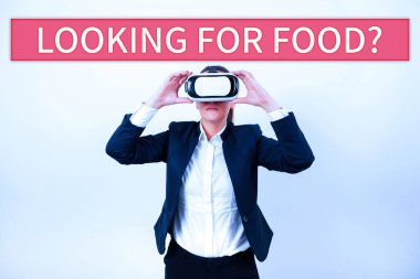 Yemek arayan, kavramsal fotoğraf çeken fakir biri yiyecek içecek bir şeyler arıyor.