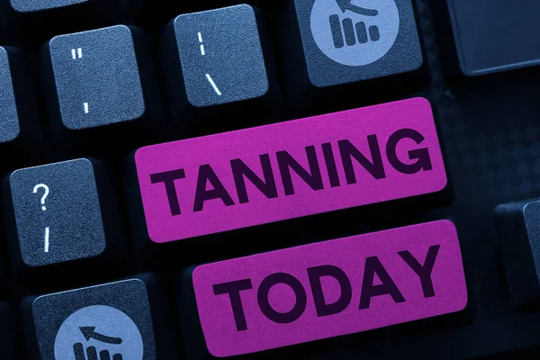 Text sign showing Tanning, Business idea a natural darkening of the scin tissues after exposure to the sun