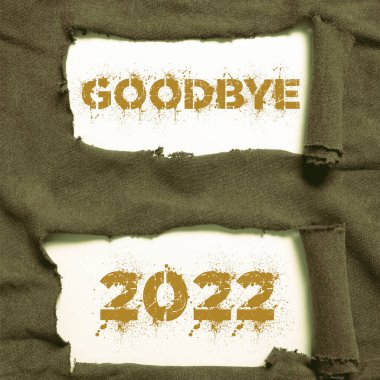 El yazısı tabelası Elveda 2023, Mutlu Noeller için kelime Mutlu yıllar yeni yıl tatili