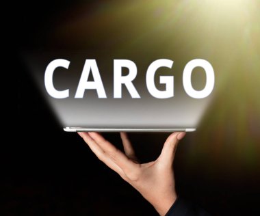 Kargo, Kavrama anlamına gelen metin işareti Bir gemi uçağı ve araçla taşınan mallar