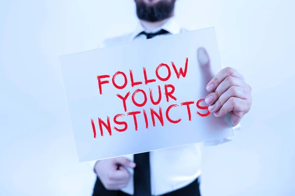 stock image Inspiration showing sign Follow Your Instincts, Business idea listen to your intuition and listen to your heart