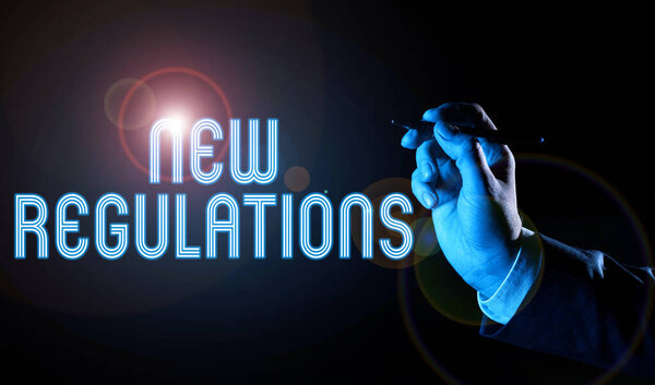 Написание текста на дисплее Новые правила, правила делового подхода, разработанные правительством или органом власти для контроля