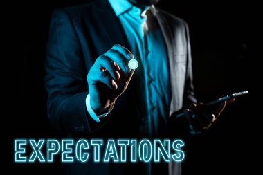 Beklentileri, iş kavramını gösteren bir tabela. Bir şey olacağına dair güçlü bir inanç.