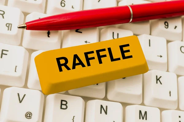 stock image Writing displaying text Raffle, Conceptual photo means of raising money by selling numbered tickets offer as prize