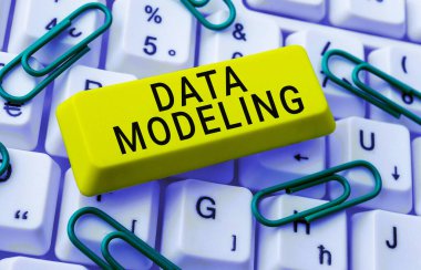 El yazısı metin Data Modelleme, veri depolama sistemleri arasında veri transferi iş genel görünümü süreci