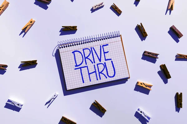 Writing displaying text Drive Thru, Business idea place where you can get type of service by driving through it