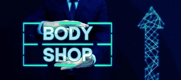 Writing displaying text Body Shop, Business overview a shop where automotive bodies are made or repaired