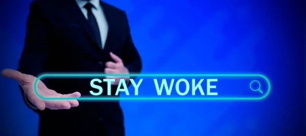 テキストの表示を書く Stay Woke コンセプトは あなたの周囲や物事を認識することを意味します情報を保持 — ストック写真