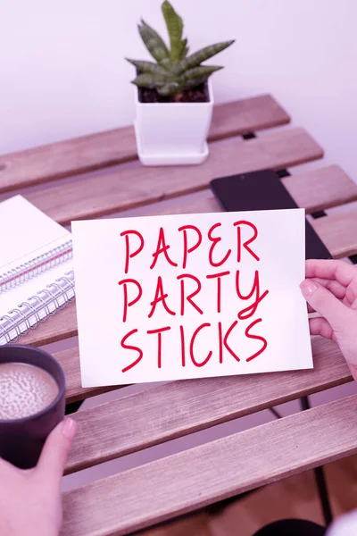 Text caption presenting Paper Party Sticks, Business overview hard painted paper shaped used for signs and emoji