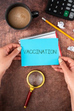 Vücudu enfeksiyona karşı güçlendiren aşı, iş yaklaşımı tedavisini gösteren bir işaret.