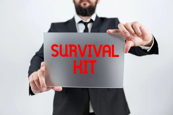 Conceptual caption Survival Kit, Business concept Emergency Equipment Collection of items to help someone