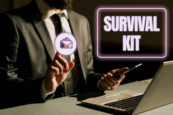 Text caption presenting Survival Kit, Concept meaning Emergency Equipment Collection of items to help someone