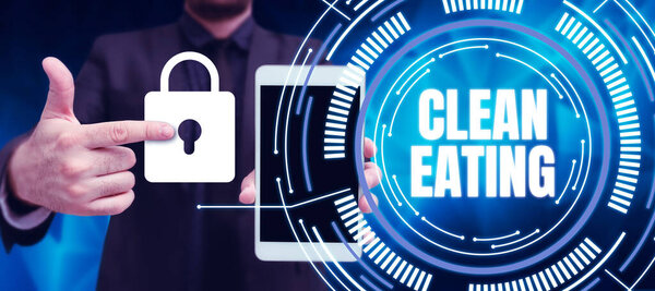 Conceptual caption Clean Eating, Word Written on Practice of eating only foods that are whole and not processed