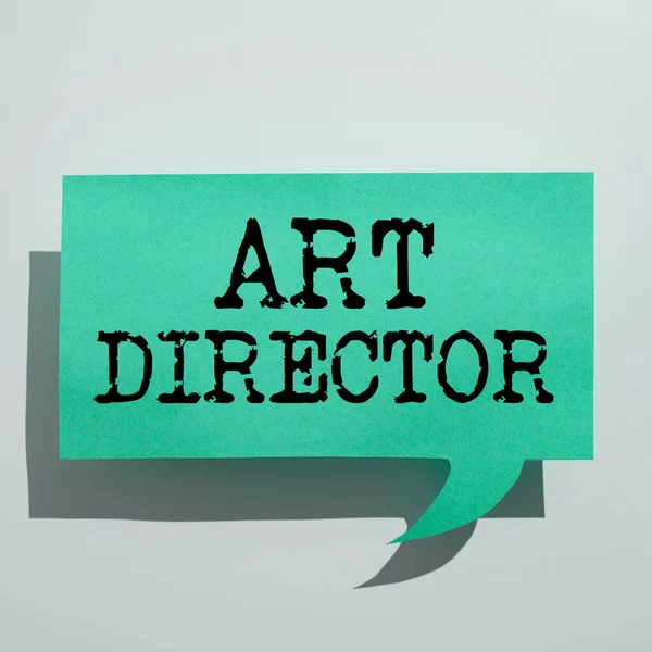 Text sign showing Art Director, Business overview responsible for overseeing the artistic aspects of a film