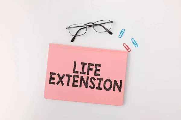 Writing displaying text Life Extension, Word for able to continue working for longer than others of the same kind