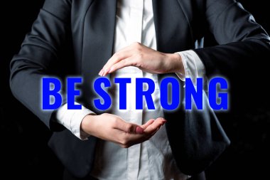 El yazısı işareti Güçlü ol, iş fikri hayattaki büyük koşullara ya da baskılara dayanabilir.