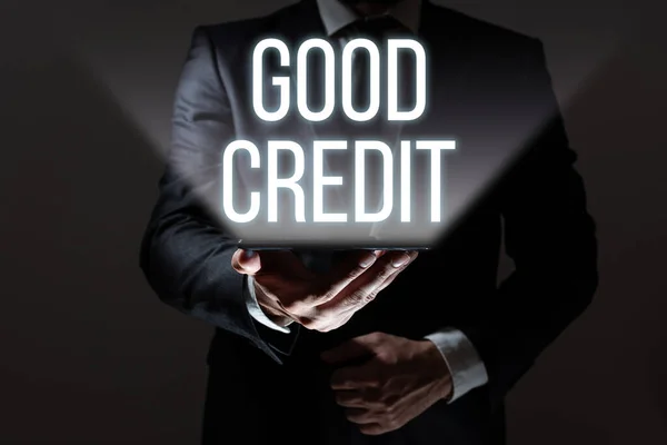 テキストを表示する書き込み良いクレジット Wordは 借り手に書かれた比較的高いクレジットスコアと安全な信用リスクを持っています — ストック写真